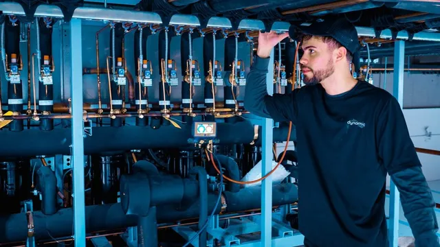 Compressor rack in a supermarket machine room monitored to cut energy costs